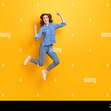 A lively person captured mid-jump.