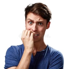A person displaying a worried and anxious expression