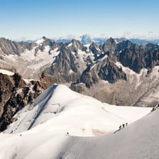 A high mountain pass running between two peaks.