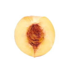 A ripe nectarine shown whole and cut open