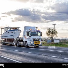 A boat carrying a substantial cargo.