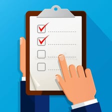 A person carrying out a task from a written plan