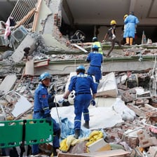 A structure showing visible damage after a destructive event.