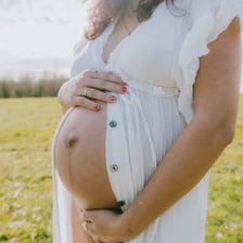 A pregnant woman with a visible baby bump
