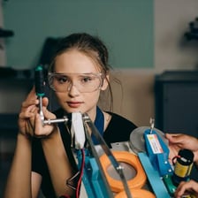A person employing a tool to complete a task