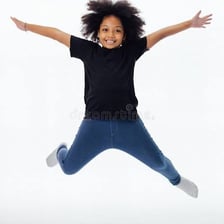 An energetic child jumping with excitement