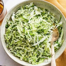 A bowl of cabbage slaw.