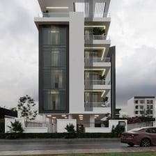 The exterior of a modern apartment building.