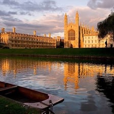 Historic university buildings beside the River Cam in Cambridge