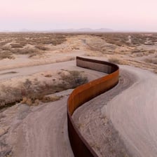 A physical boundary marking the border between two countries