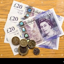 British banknotes and coins representing money or financial means.