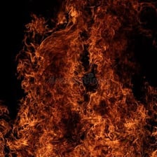A large fire burning with intense flames.