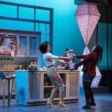 Actors performing a scene in character