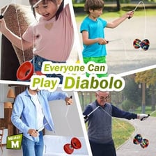 A child spinning a diabolo toy on a string