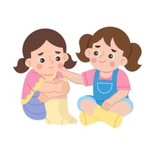 An adult comforting a visibly upset child