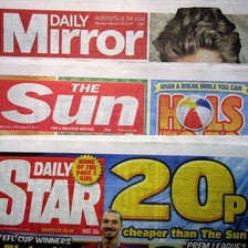 A red-top copy of The Sun newspaper.