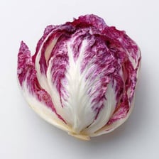A head of red-and-white radicchio leaves.