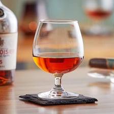 A glass of amber brandy