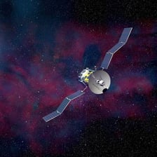 An unmanned space probe travelling through deep space.