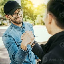 Two friends greeting each other.