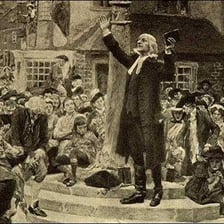 A preacher addressing an outdoor audience