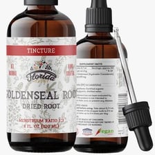 A small dropper bottle containing a herbal tincture