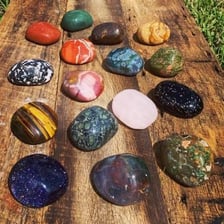 An assortment of stones arranged on a table.