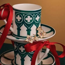 A delicate teacup and saucer made from bone china.
