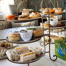 A British high tea laid out on a table.