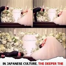 A person bowing as a formal gesture of respect