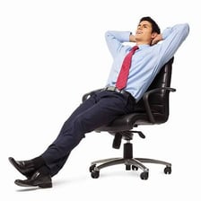 A person seated in an occupied office or chair