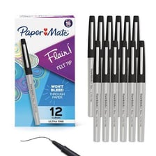 A felt-tip pen being used to write on paper.