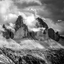 A landscape under dark, stormy and inclement weather.