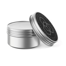 A polished metal surface displaying a bright lustrous sheen