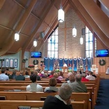 People attending a religious worship service