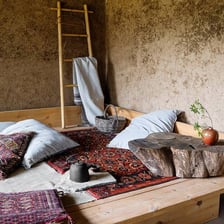 A rustic, earthy scene illustrating an unrefined style.