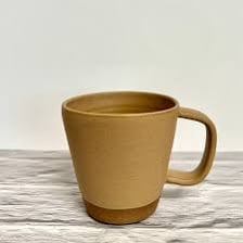 A cup of black Americano coffee.
