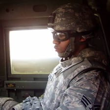 A radio operator receiving and relaying information