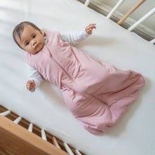 A newborn infant lying in a blanket