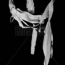 A piece of fabric badly torn into tatters.