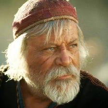 A film still showing actor Oliver Reed.