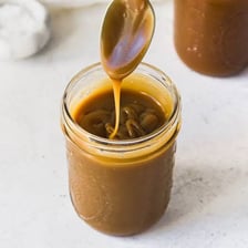 A glossy golden-brown caramel sauce.