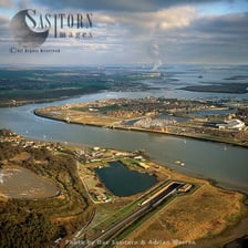 Aerial view of the River Medway widening into its estuary in Kent