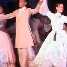 Dancers performing a habanera-style dance.