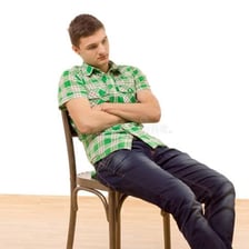 A person looking wistful and contemplative.
