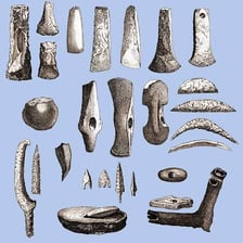 Prehistoric tools and cave art associated with the Stone Age.