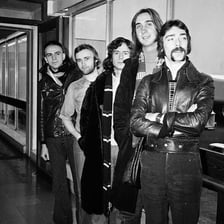 Genesis performing as a progressive-rock band