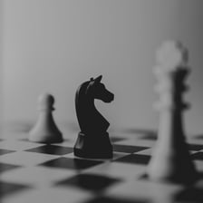 A chess knight contrasted with a dark night scene