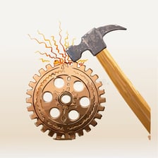 A hammer striking an object with a visible impact