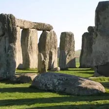 A Wiltshire landscape with Stonehenge visible in the countryside